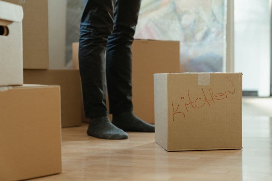 Moving boxes labelled for the kitchen